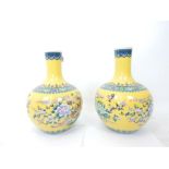 A pair of Chinese famille jeune palette porcelain vases