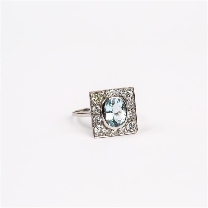 An 18 ct white gold, Art Deco style, aquamarine and diamond cluster ring