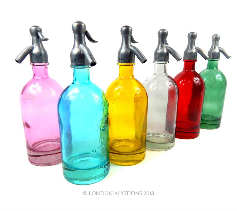 Set of six coloured glass soda siphons