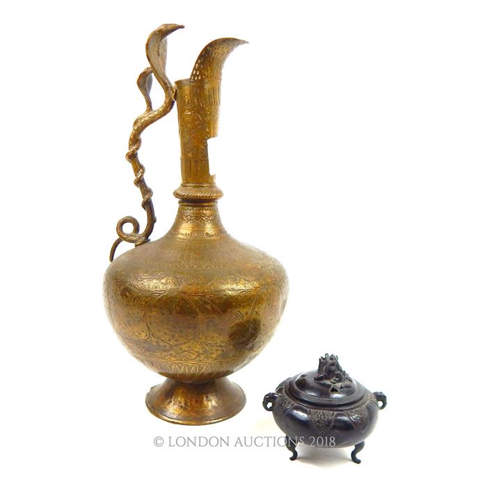 Chinese bronze three footed censer with lid and a pair of handles (H: 11 cm W: 12 cm D: 10 cm),