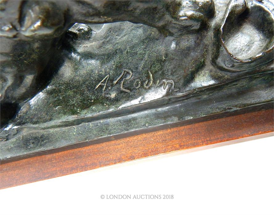 A bronze lion on wooden base, after Auguste Rodin - Image 3 of 4