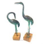 Pair of bronzed metal figures of storks