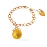 A 9 ct rose gold large curb link chain bracelet with 1885 gold sovereign charm