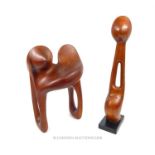 Two mahogany modernist sculptures, Joe Lennard