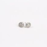 A boxed pair of 18 ct white gold and diamond cluster earrings, (0.52 carats total)