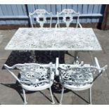 A white painted aluminium garden table with four matching chairs