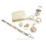 A collection of silver items and a silver cigarette case