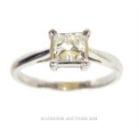 An 18CT W/G princess cut diamond of 3/4 of a carat