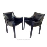 A pair of 1970's, 'Cassina', Italian, designer, black leather chairs