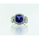 An impressive, 18 ct white gold, tanzanite and diamond ring