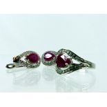 A sterling silver, natural ruby and white crystal earrings and ring set