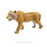 A cold-painted, bronze figure of a prowling tiger