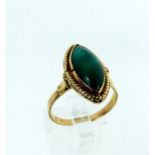 A boxed, 14 ct yellow gold ring set with a marquise-shaped green chryoprase