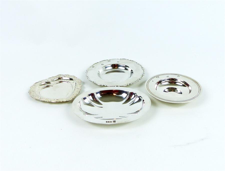 Four, solid silver pin dishes