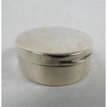 An Edwardian Sterling Silver Pill Box.