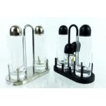 A near pair of Italian Alessi cruet sets