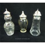 Antique, sterling silver topped and cut-glass, sugar shakers