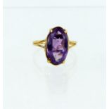 A boxed, 14 ct yellow gold, amethyst solitaire ring