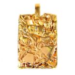 A high carat, yellow gold, chunky, melted gold, ingot pendant