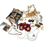 A large collection of vintage, costume jewellery items