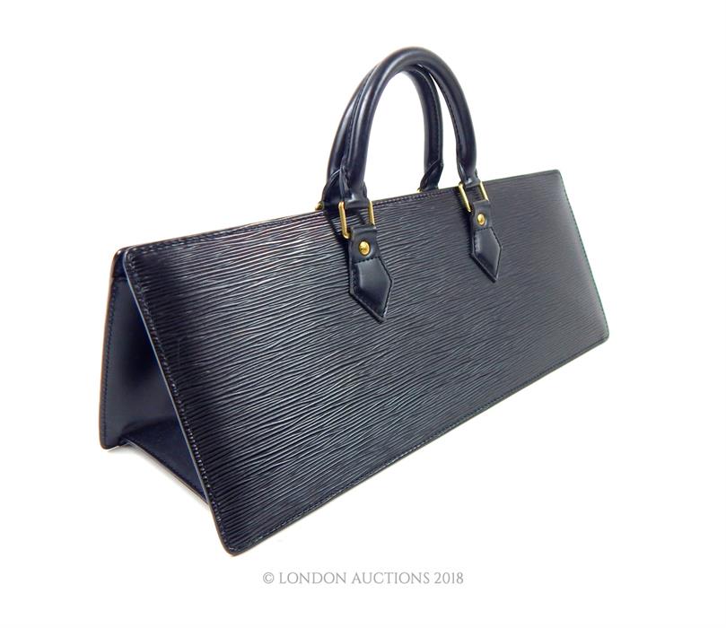 A Louis Vuitton, black, leather handbag