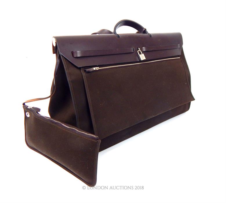 A Hermes, men's, large chocolate brown leather and fabric holdall - Image 3 of 3