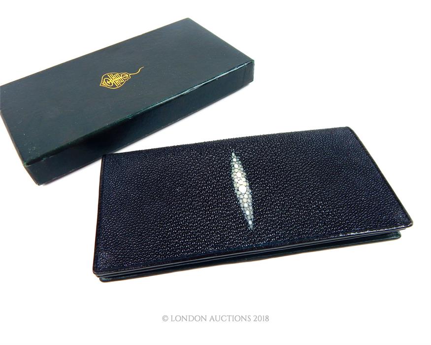 An unused, boxed, shagreen (ray skin) wallet