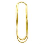 An 18 ct yellow gold, three-strand, necklace