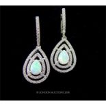 An Art Deco Style Silver Cubic Zirconia and Opalite Double Halo Earrings.