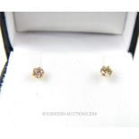 A Pair of Diamond Stud Earrings.