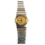 An Omega, ladies, stainless steel and gilt metal wristwatch