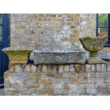 Three, antique-style, composite-stone planters