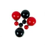 Two pairs of sterling silver, stud earrings set with red and black beads