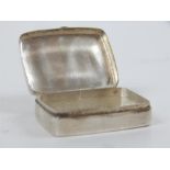 A rectangular Sterling Silver pill box.