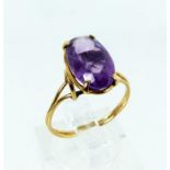 A boxed, 14 ct yellow gold, amethyst solitaire ring