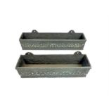 Two cast iron rectangular plant troughs