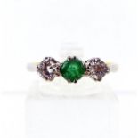 A 9 ct yellow and white gold, emerald and double-diamond ring