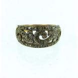 A 9 ct yellow and white gold diamond, floral arabesque ring