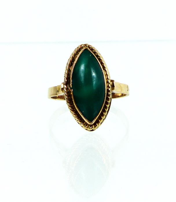 A boxed, 14 ct yellow gold ring set with a marquise-shaped green chryoprase