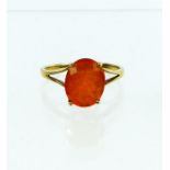 A boxed, vintage, 9 ct yellow gold ring set with a faceted, Madeiran garnet
