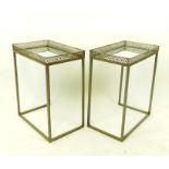 A pair of silver-coloured metal and mirrored-topped, occasional tables