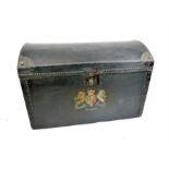 An antique dome top trunk, hand painted with the Royal Coat of Arms
