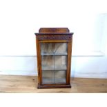 An Edwardian, oak and glazed cabinet