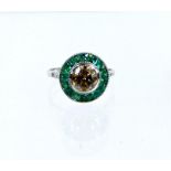 An 18 ct white gold, Art Deco style, diamond and emerald cluster ring