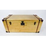 A gold coloured Andrew Martin style trunk