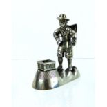 A Silver Coloured Metal Cast Figure of a Prospector.