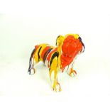 A resin sculpture of a bulldog with splashes of colour