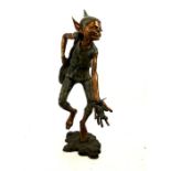 A large, bronze Goblin sculpture