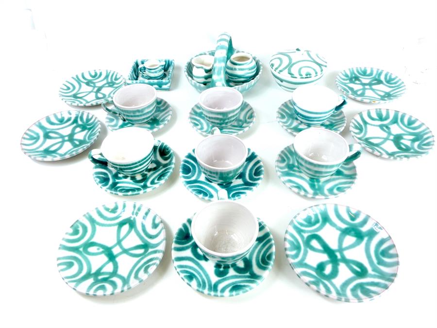 A 20th century, German ceramic tea set in a green and white glaze