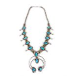 A native American sterling silver and turquoise necklace